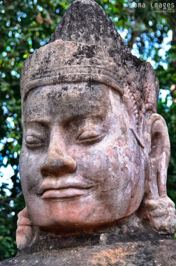 Roadside statue stands guard, Angkor Wat, Cambodia
