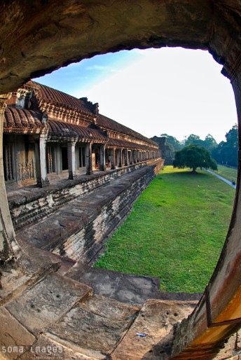 Peering out of Angkor Wat in Cambodia